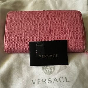 Pink Versace Wallet New with authentication card and tags 
Versace Pink